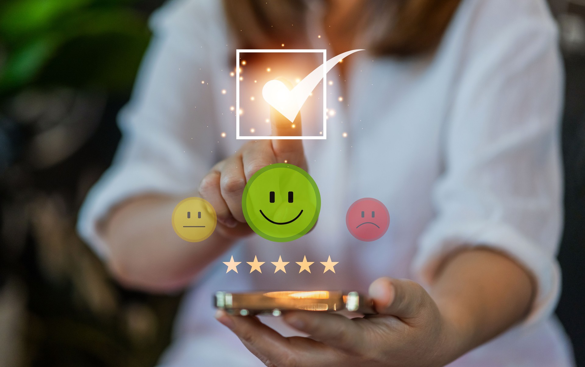 Customer satisfaction feedback with five star rating system, hand hold smartphone with digital smiley face quality service review, business evaluation, client experience, online review management
